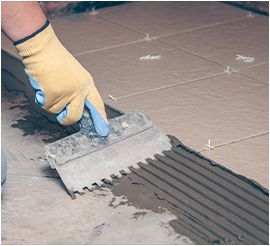 Adhésion des carreaux